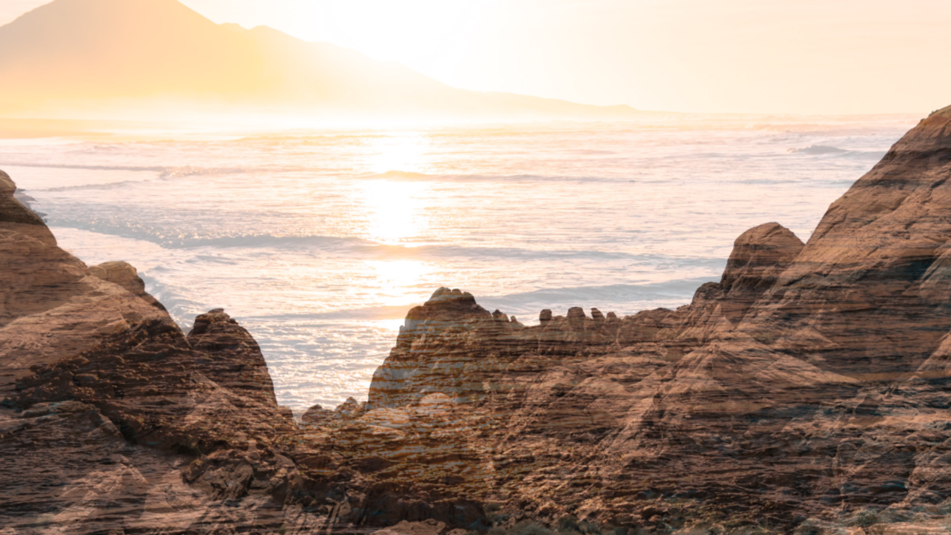 Beach through mountains